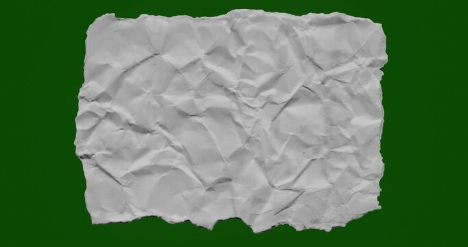 Crumpled White Paper Roll on Green Background &ndash; Stop Motion Graphics, Abstract Animation for Texture Background.