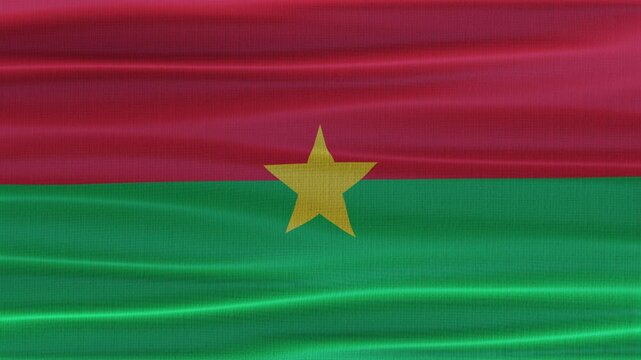 Burkina Faso flag waving in the wind with high quality fabric texture