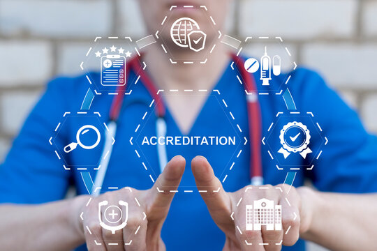 Concept of medical accreditation. Doctor using virtual touch screen presses the text ACCREDITATION. Pharmacy and health care warranty, standards, ISO quality certification and guarantee.
