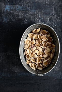 Pistachio shells in a bowl 