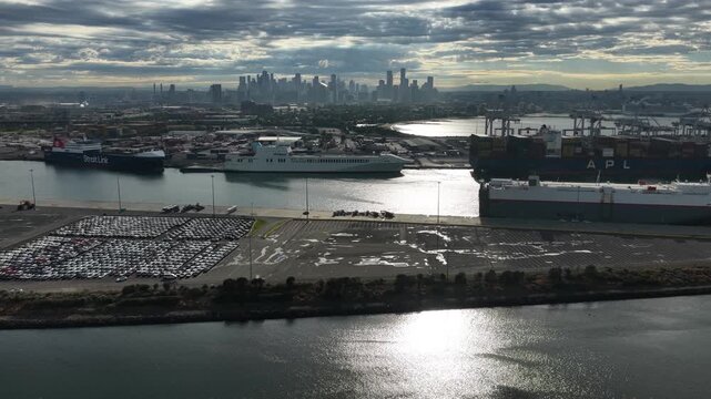 Melbourne, Australia - March 25, 2026: Wide aerial panorama of shipping port and city skyline