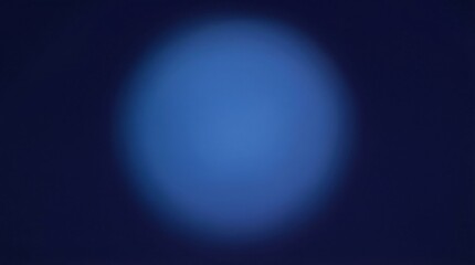 Obraz premium Minimalist deep blue composition centered on a large soft light blue blurred orb that glows gently creating a sense of depth and focus suitable for high technology branding or futuristic marketing