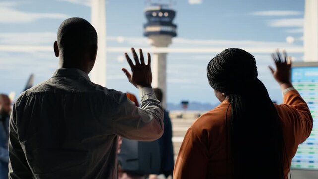 Waving goodbye at airport, sad mother and father, daughter studying abroad, traveling alone and boarding at terminal gate. Supportive parents bid farewell to solo traveler girl student.