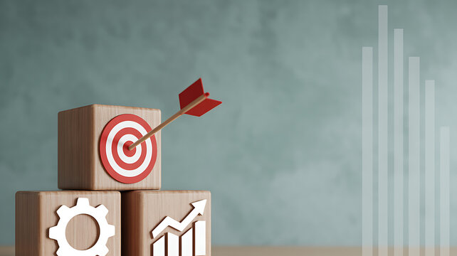 A red dart hits a target atop wooden blocks with growth charts in the background