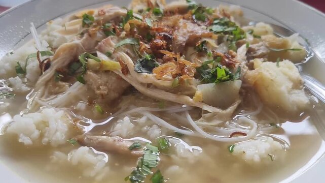 Soto Banjar Served on The Table. Soto Banjar is Traditional Indonesian Chicken Soup from Banjarmasin. Indonesia