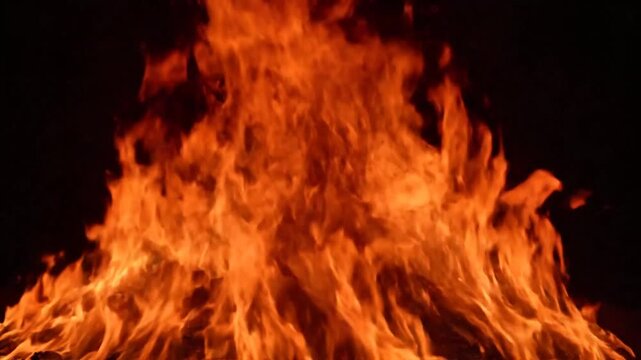 Vibrant orange flames burning brightly upwards.