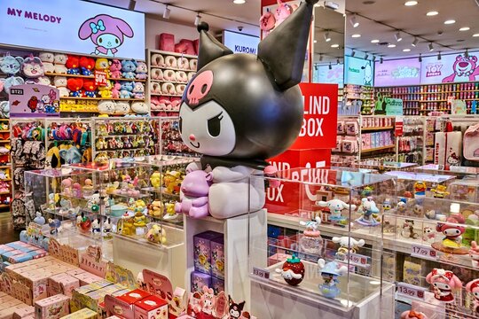 Ambato, Ecuador - June 09, 2025: Kuromi character display at Miniso shop in Mall de los Andes, showcasing vibrant Sanrio merchandise and colorful plush toys with copy space