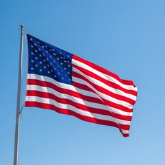 Fototapeta premium American Flag Waving in Clear Blue Sky