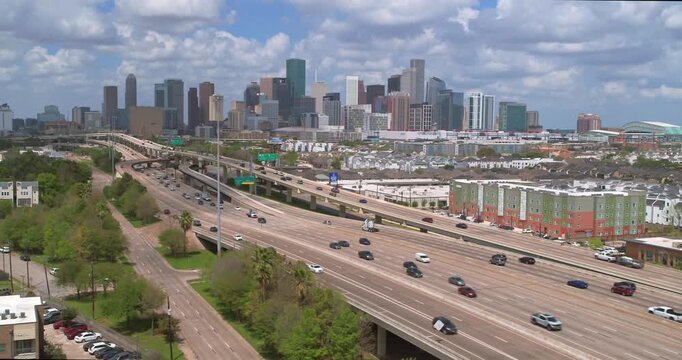 Drone view of cars on I-45 North and Houston, Texas urban landscape