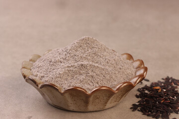 Black glutinous rice flour is a finely milled powder made from black sticky rice. © menik