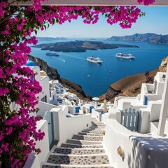 Fototapeta premium Whitewashed village cascades down to blue sea with cruise ships