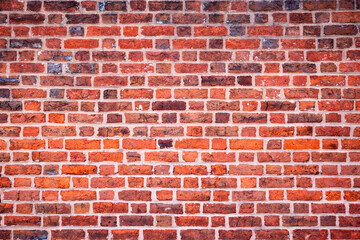 Fototapeta premium Red brick wall surface background. Old bricks masonry wall pattern. Rustic bricks wall texture structure. Grunge bricks classic wall.