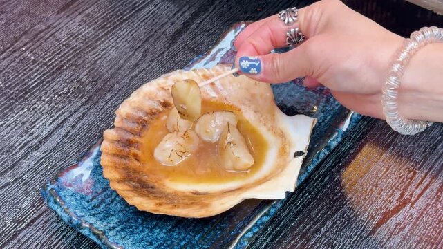 Grilled Scallops Served in Shell at Tsukiji Outer Fish Market Tokyo