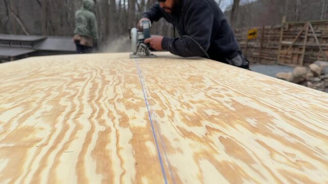 Low vantage point ripping plywood