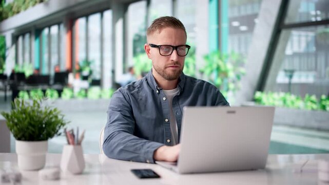 Sustainable Business Analyst Studies Eco-friendly Solutions