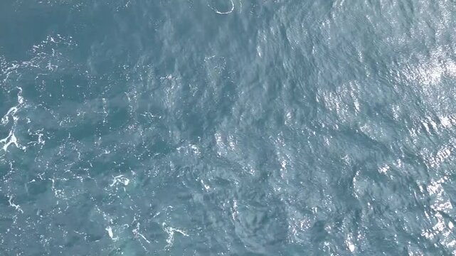 small waves on the edge of a moving ship