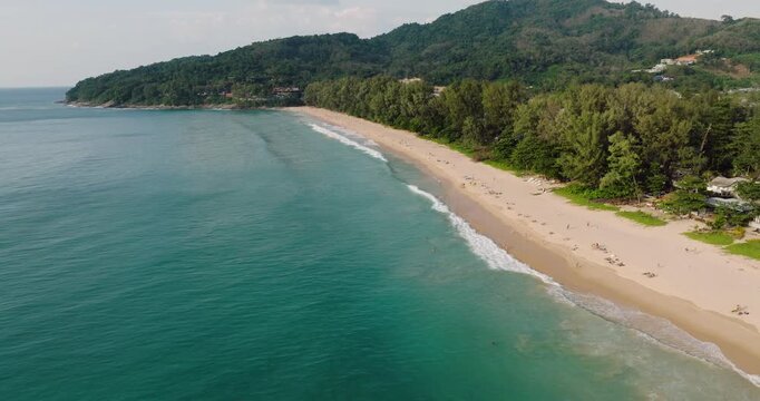 Aerial View Of Nai Thon Beach Lined With Tropical Trees In Phuket, Thailand.