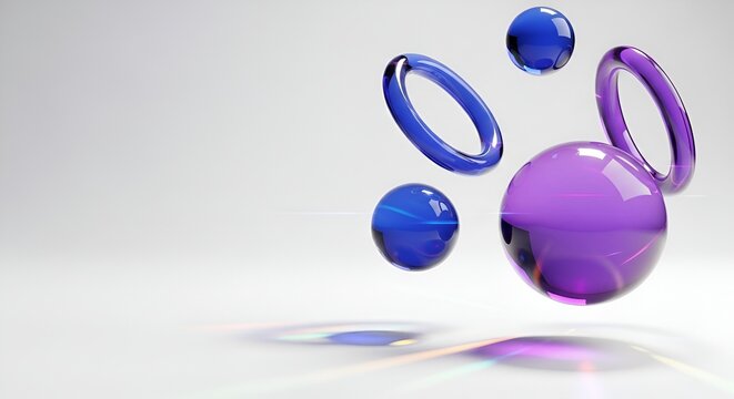 3D rendering of colorful glass spheres and rings floating in air