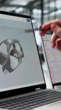 Mechanical Engineer Carefully Analyzes 3D Stress Simulation Results