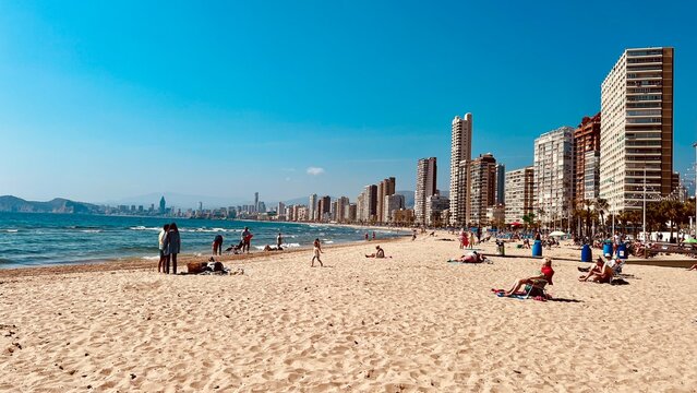walking on the beach Benidorm