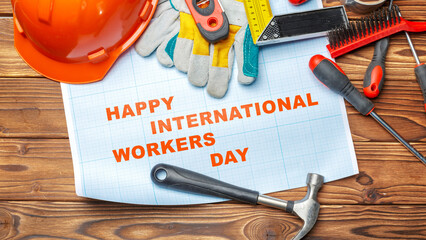 Workers celebrate international workers day with tools and symbols of labor on May 1