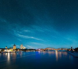 Night View Of Cologne Cathedral And Hohenzollern Bridge, Germany. Europe.