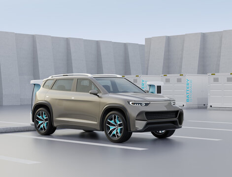 Electric SUV charging at charging station. Cargo container with Energy storage system at background. 3D illustration.