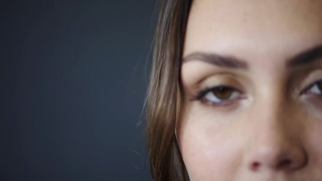 Optometry, eye care and face of woman in studio with contact lenses for prescription for eyesight. Space, optical health and portrait of person by gray background with vision or ophthalmology test.