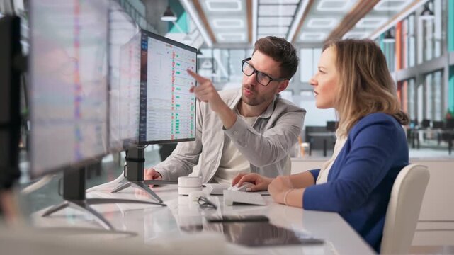 Medical Coder Carefully Reviewing Patient Bills And Entering Data