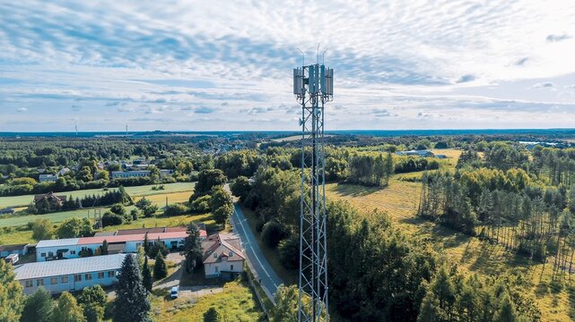 Telecom tower on open cultivated fields