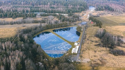 Sewage treatment infrastructure in outdoor landscape © AlexGo