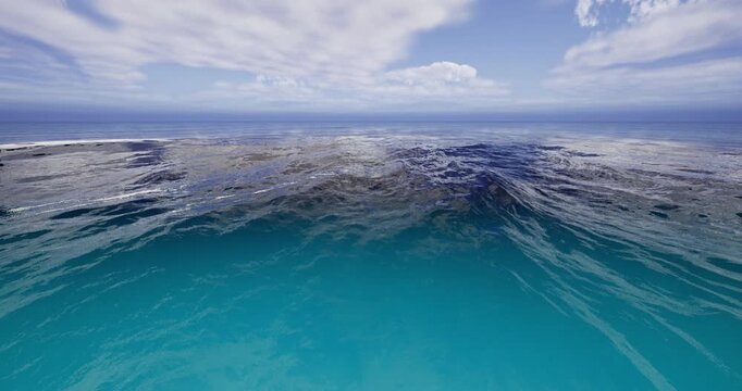 Vast ocean waters appear tranquil, showcasing a gradient of deep blue to turquoise. Gentle waves ripple under a clear sky with scattered clouds, inviting relaxation and exploration.
