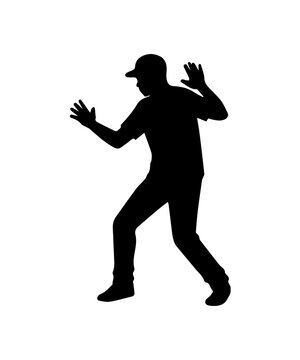 Man silhouette with hands up surrendering afraid