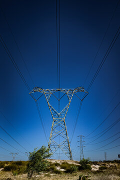 Power Lines for Electricity against a blue sky