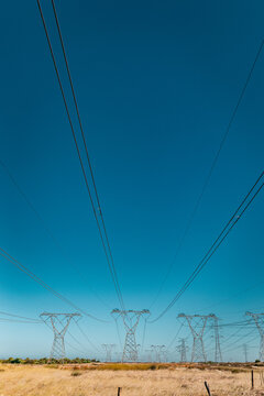 Power Lines for Electricity against a blue sky