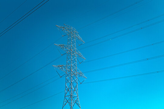 Power Lines for Electricity against a blue sky