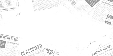 Obraz premium Scattered grey and white newspaper clippings with headlines and text fragments print article