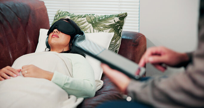 Psychology, treatment and woman on sofa with headphones, relax or psychedelic counseling. Mental health, psilocybin therapy and person on couch with alternative medicine for anxiety, trauma or stress
