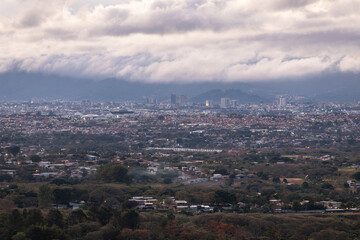 Obraz premium Clouds over City San Jose and Alajuela, Costa Rica.