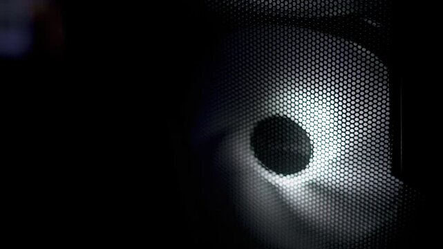 Vibrant RGB computer cooling fan with rainbow lights in PC case