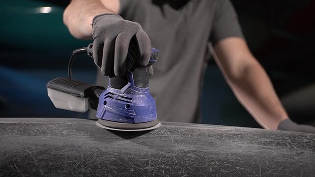 Boat repair. Hand-held power tools. Carbon fiber. Slow motion video. . High quality 4k footage