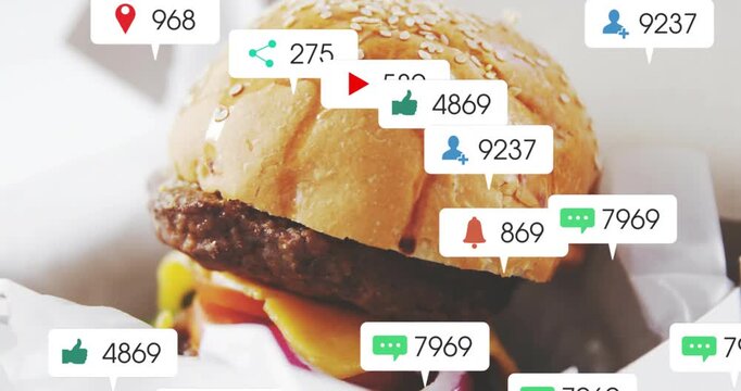 Notifications appearing on sesame burger, floating up and obscuring bun, showing social attention