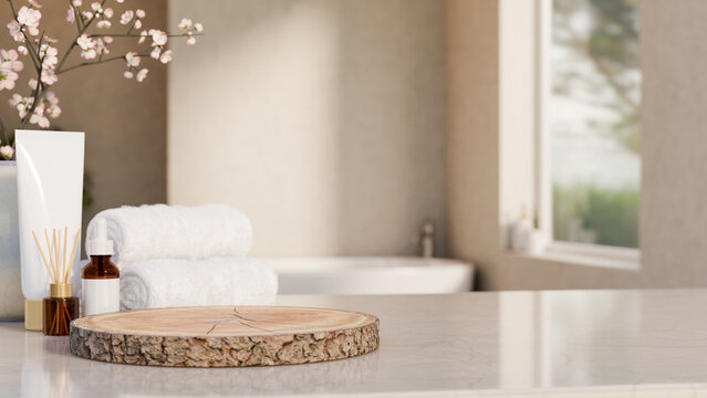 Round wooden log tray aside white towel with skincare and diffuser on marble counter in spa bathroom