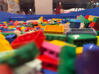 Naklejka premium Colorful scattered lego bricks