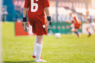 Youth Soccer Goalkeeper on Field, Kids Football Match View from Behind Near Goal Area