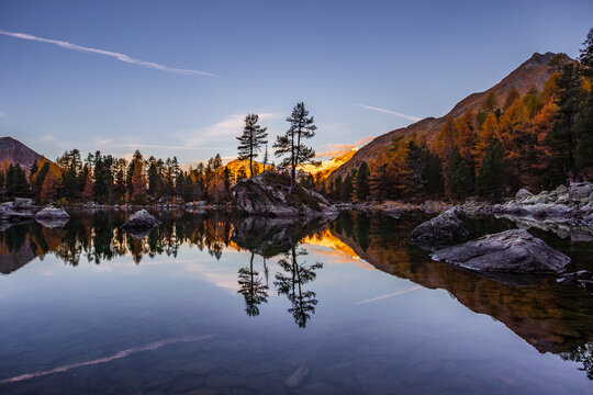 Sunrise over the Saoseo Lake, with snow mountain in the background, Swiss Alps mountain, Canton Grisons, Switzerland