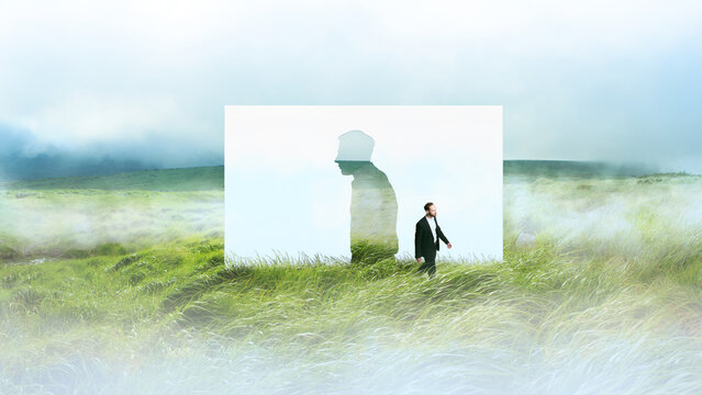 Man walking past human silhouette cutout in foggy grass landscape. Concept of life transition moment, identity shift process, career change direction, personal journey decision.