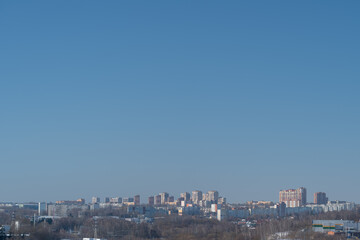 Naklejka premium Modern metropolitan area with clustered apartment complexes under bright sunlight. Urban development scene showcasing midrise residential buildings and active growth atmosphere