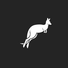 Fototapeta premium White Kangaroo Jumping Silhouette on Black Background Graphic