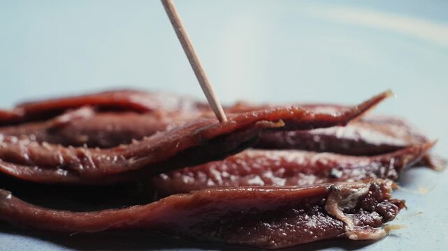 Traditional Catalan snacks for wine, beer and vermouth, Cantabrian anchovies. High quality 4k footage